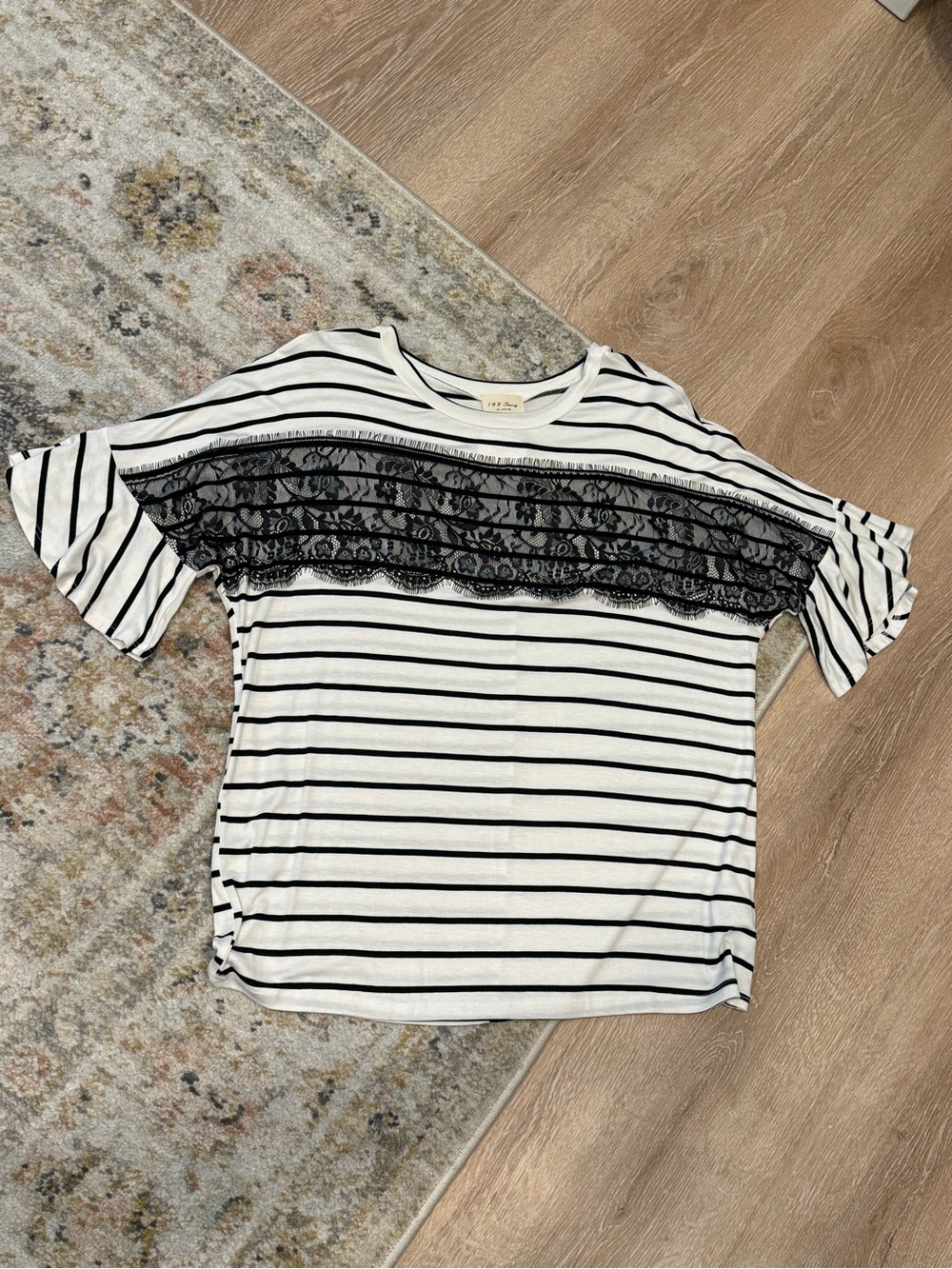 Boutique Women’s Black and White striped lace shirt size medium